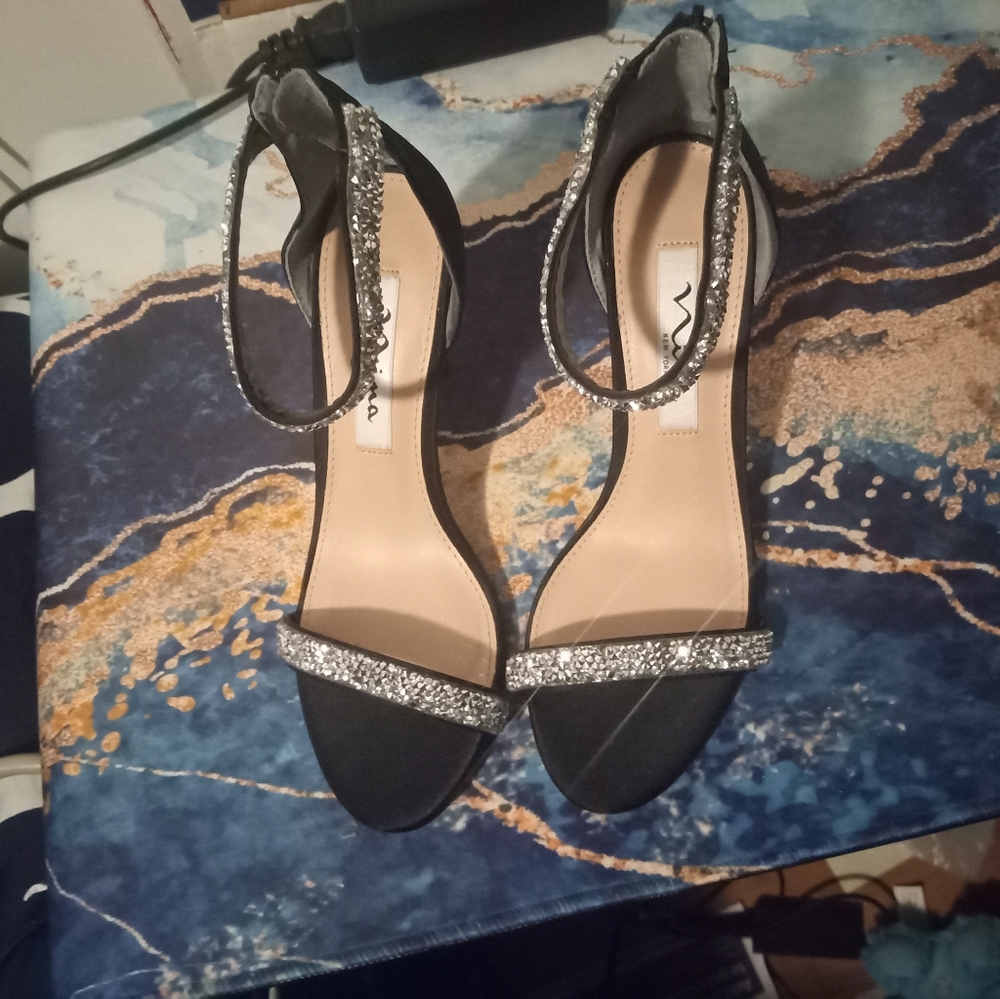 Women black stiletto heel size 5.5